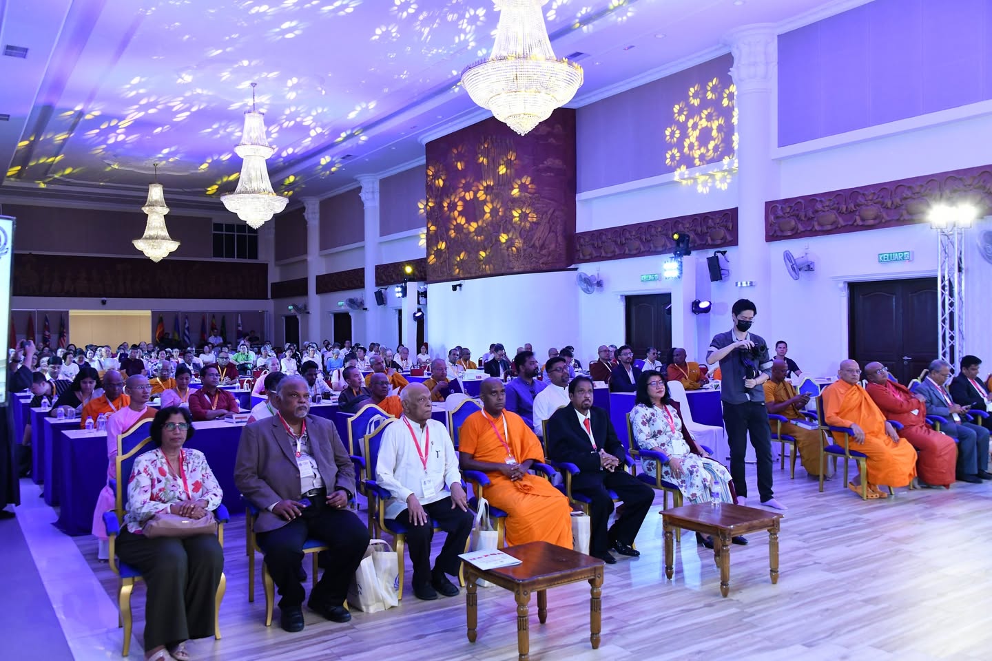 Participants seated in the hall during the Buddhism in the 21st Century conference