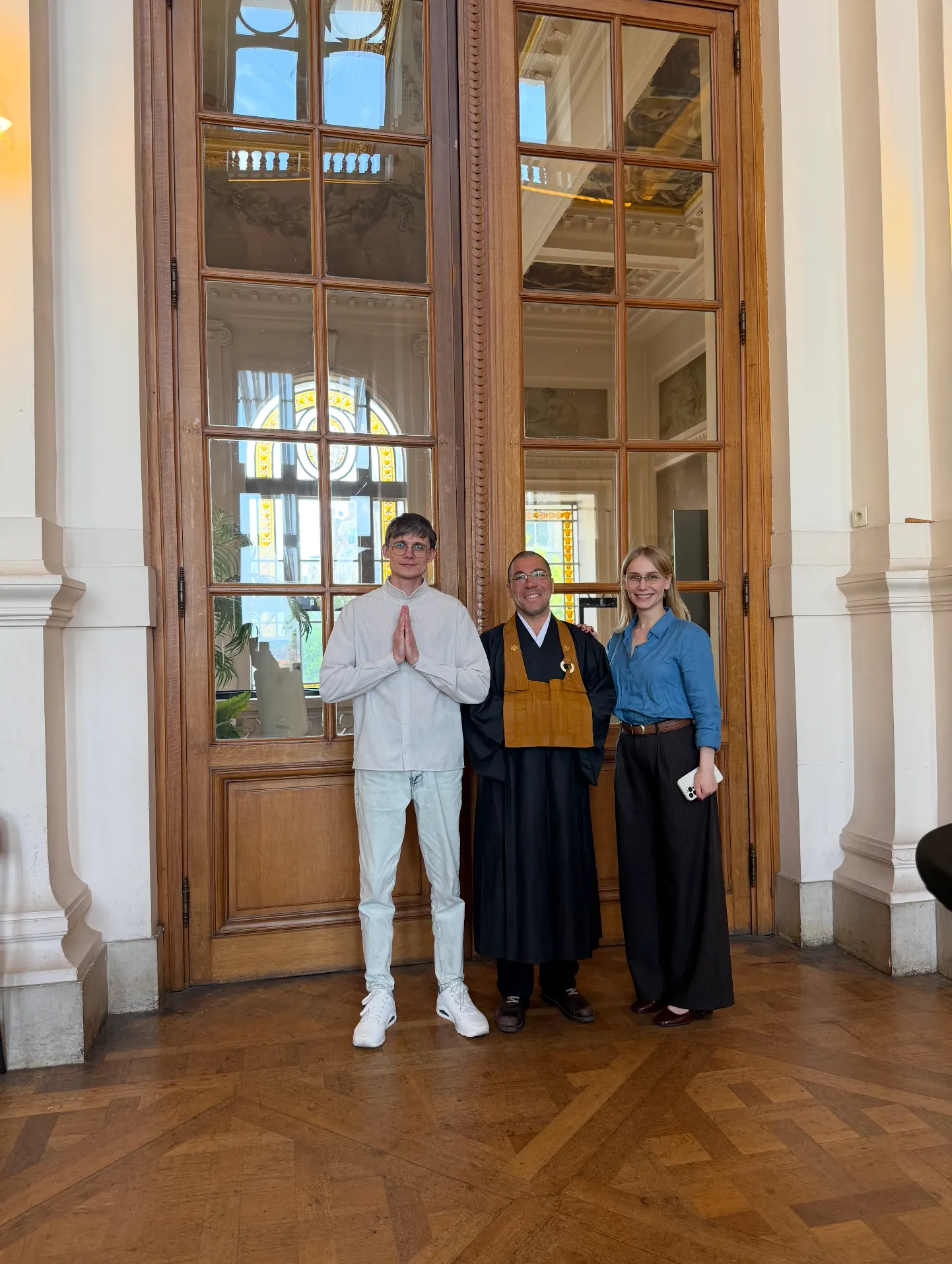 Representatives of the Ukrainian Buddhist community with a monk in Brussels